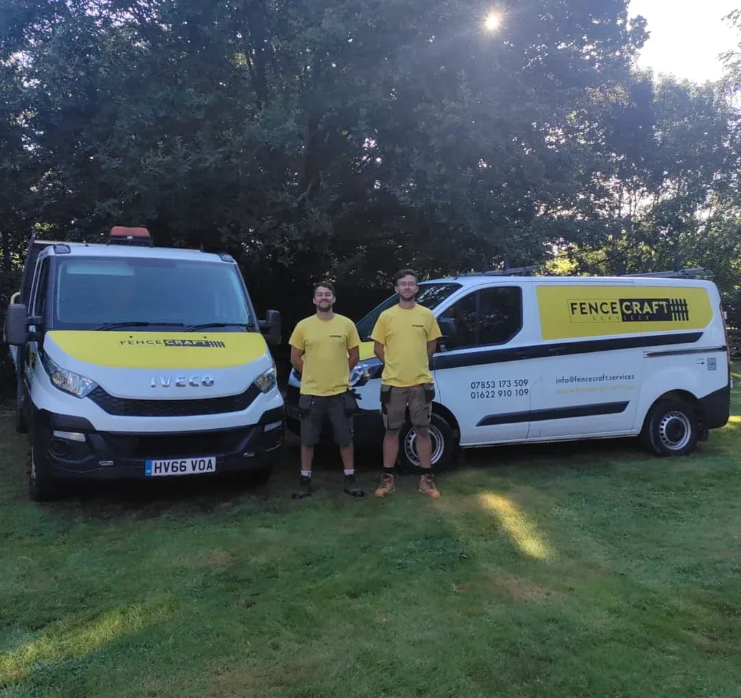 Matt and Chris of Fencecraft Services with their branded yellow vans